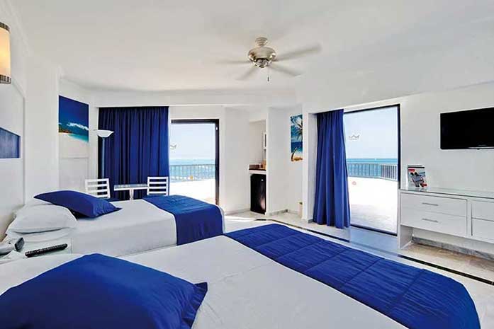 Hotel riu caribe habitacion frente playa